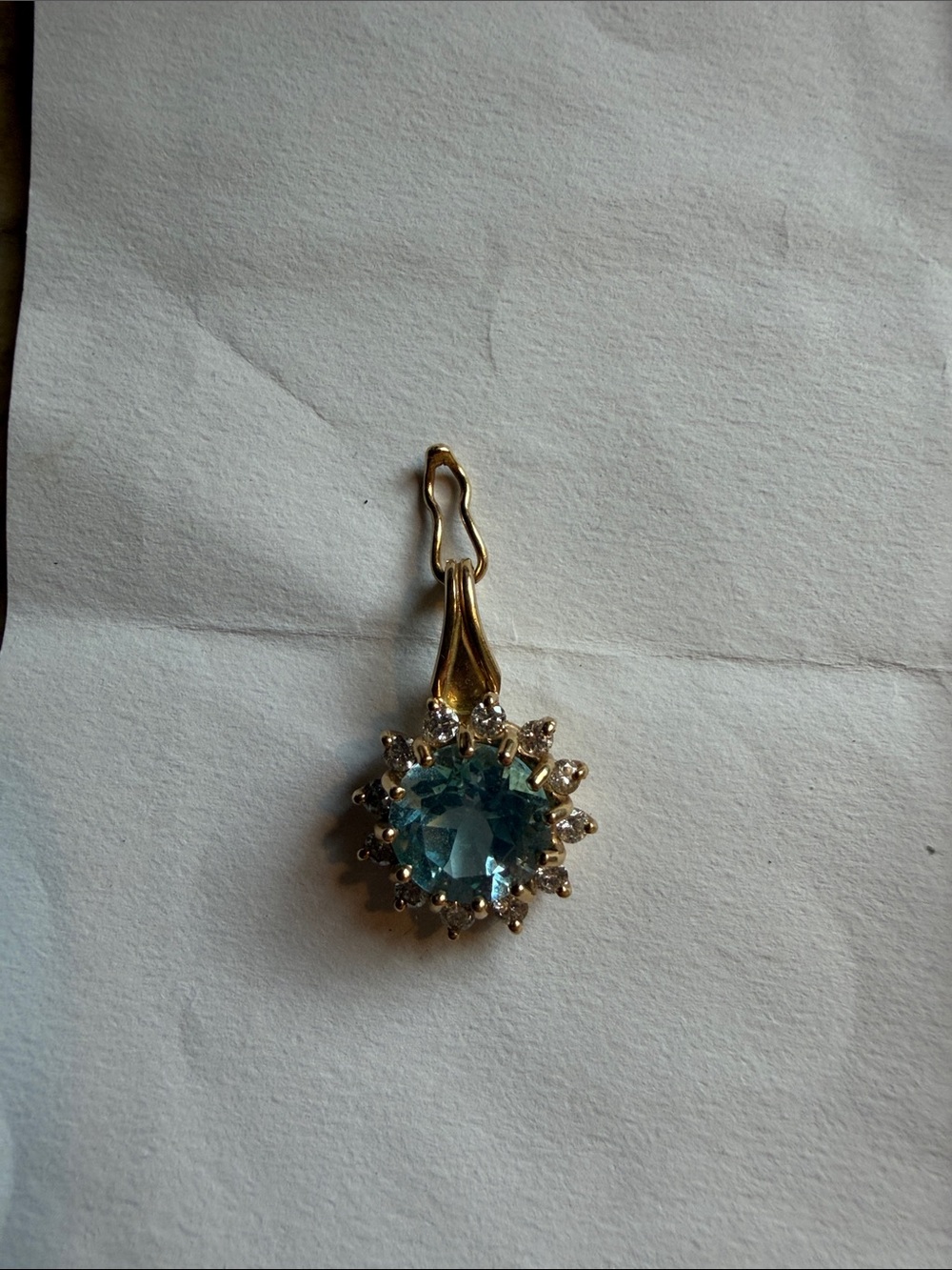 14k gold pendant, blue topaz